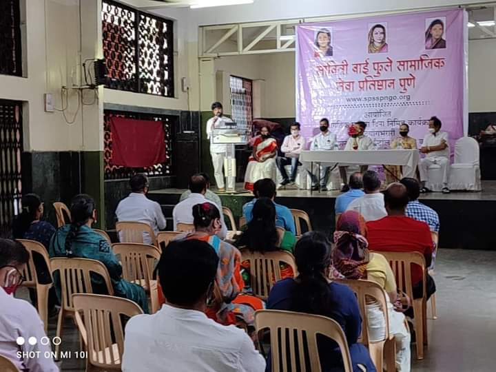 Community members gathered for a meeting, showcasing community engagement.